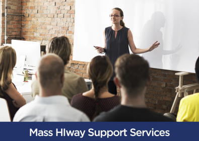 Woman standing in front of group presenting
